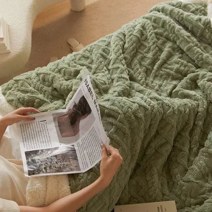 Close-up of a soft plush winter throw blanket, perfect for cozying up. Luxurious and insulating home decor.
