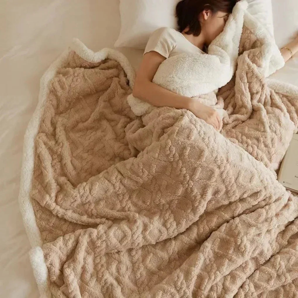 Elegant plush winter blanket, a soft and warm throw for your sofa or bed. Adds luxurious home decor and coziness.