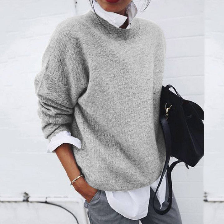 Modern knit women's pullover, luxurious and timeless design, essential fall/winter casual chic.