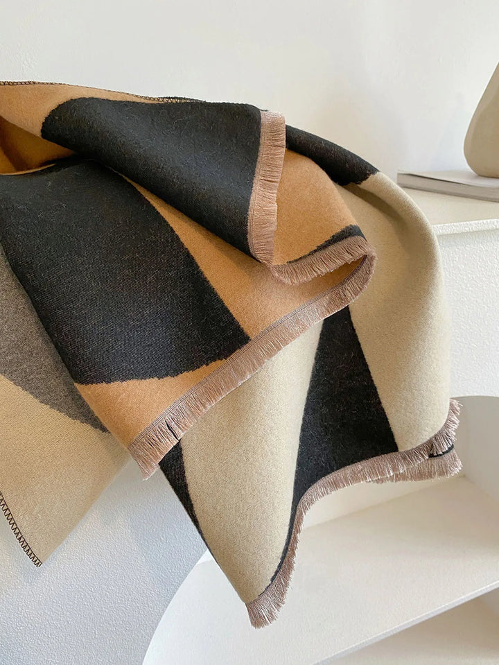 Beautiful women's reversible cashmere scarf, adding warmth and elegance to any fall outfit.