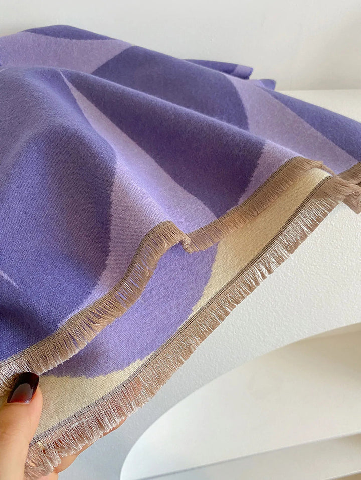Cozy & stylish women's reversible cashmere scarf; a luxurious winter accessory for ultimate warmth.