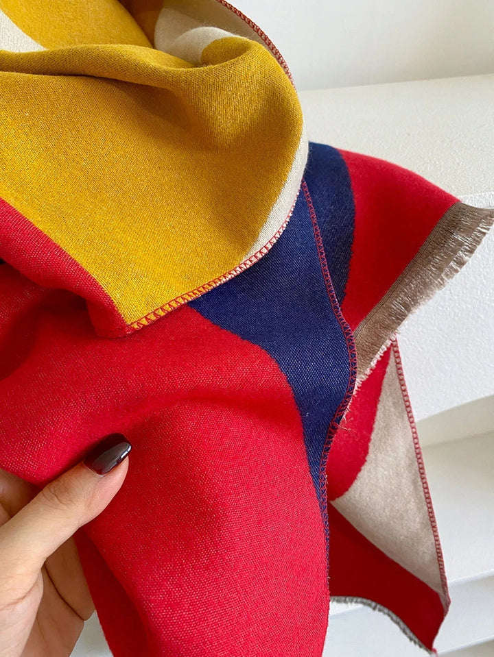 Sophisticated reversible cashmere scarf, ideal warm winter accessory and luxury gift.