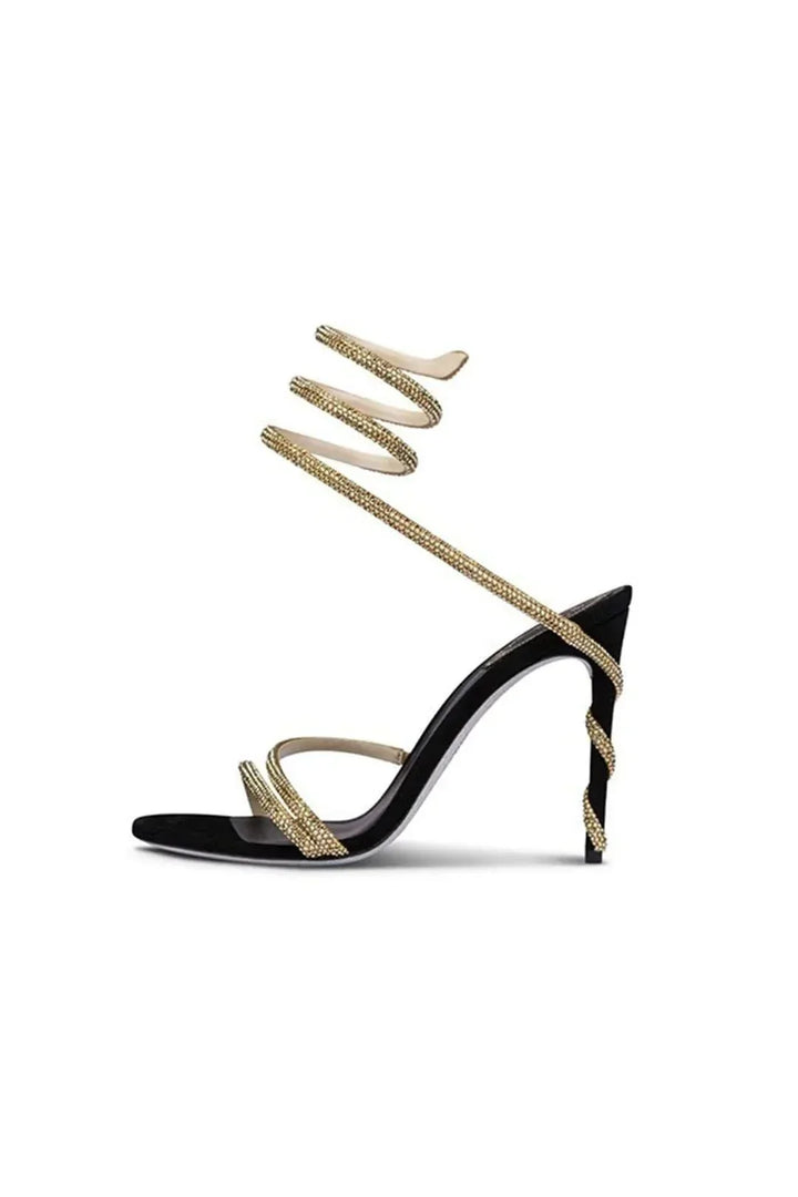 Elegant white crystal stiletto high heels for women, featuring a striking spiral ankle wrap, perfect for galas.