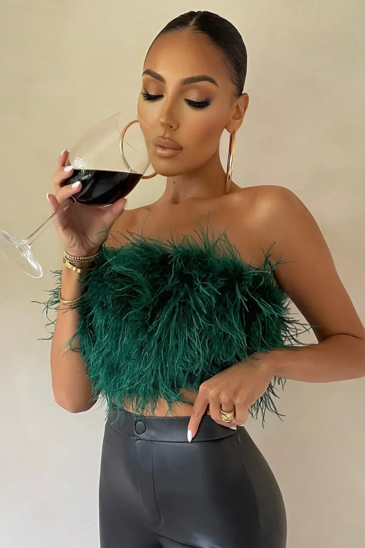 Statement feather-trim tube top, an elegant sleeveless top for women's night out.
