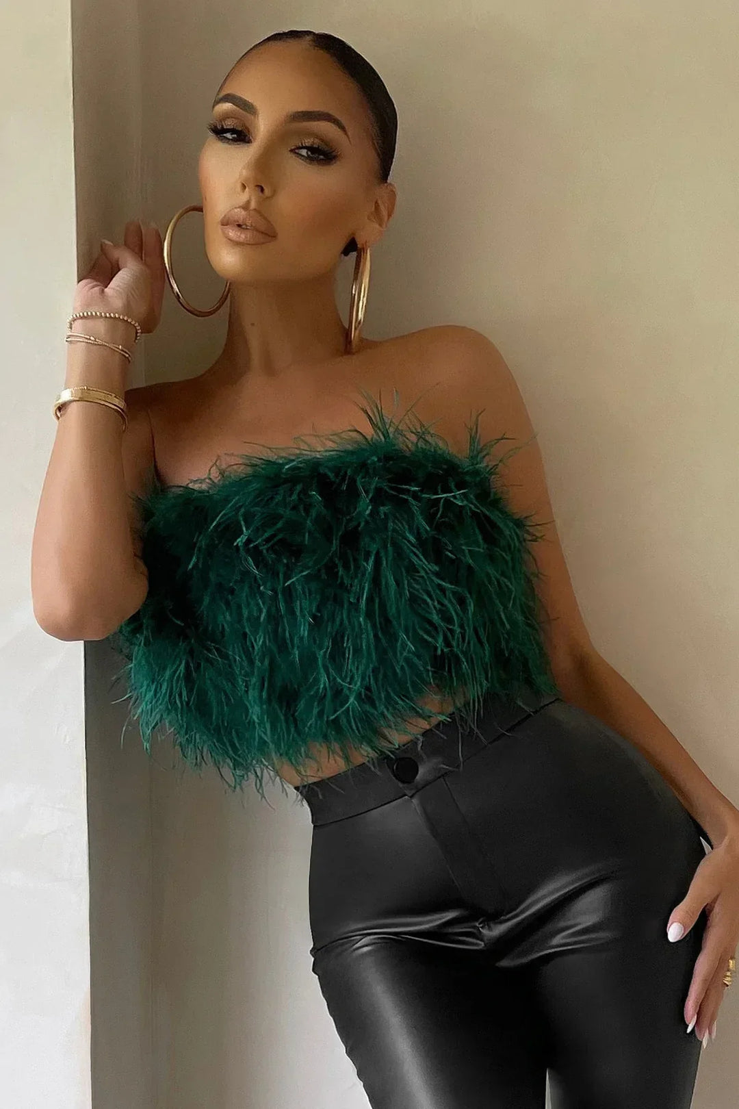 Chic going out top: Women's feather-trim tube top, a fashionable crop top.