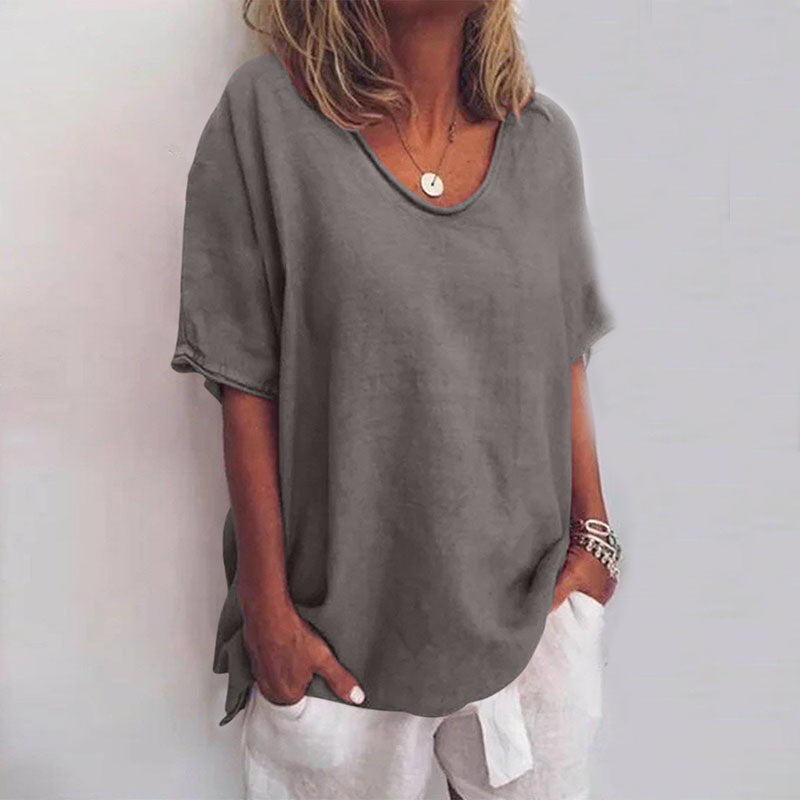 Stylish women's loose blouse with effortless tummy coverage, perfect for casual chic everyday wear.