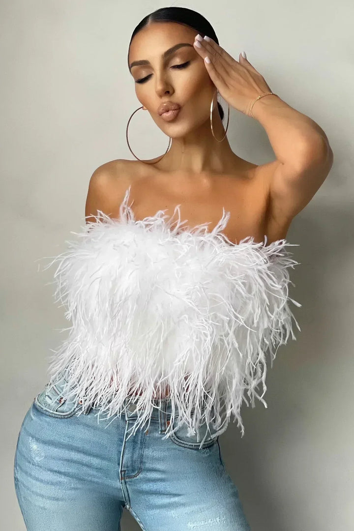 Trendy feather crop top for women, a chic sleeveless statement piece.