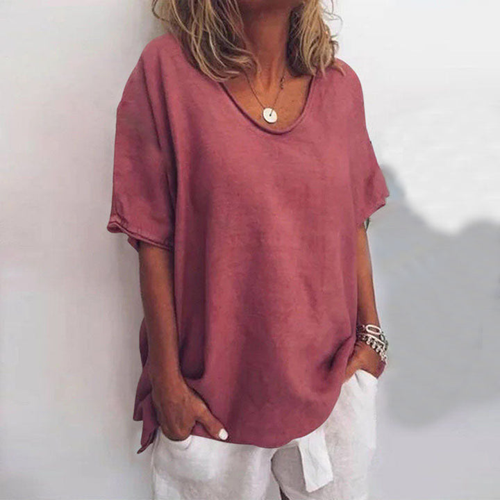 Chic women's top, designed with a loose fit for effortless tummy coverage & a stylish, comfortable look.