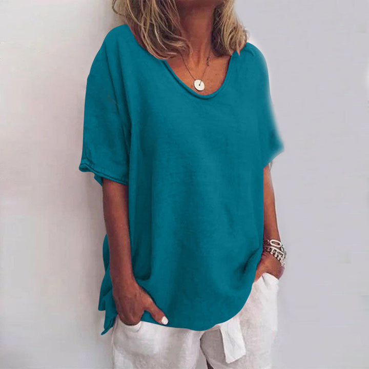 Stylish women's loose blouse, offering comfortable tummy coverage; an elegant & versatile fashion top.