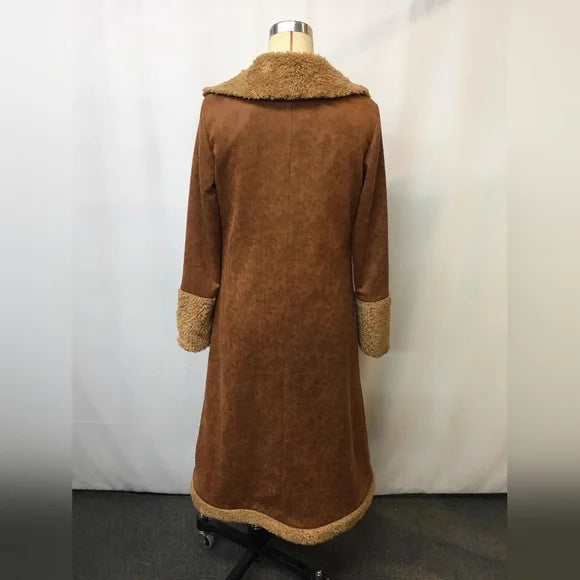 Timeless women's trench coat, an elegant long jacket with a classic design and stylish details.