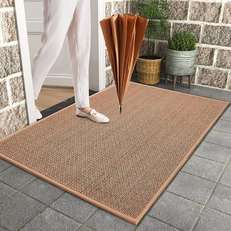 Machine washable woven indoor door mat with a timeless weave pattern, non-slip backing, and plush polypropylene surface.