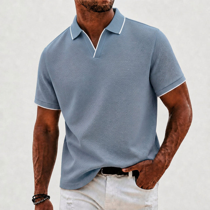 Men's fashion knit polo with classic collar, sophisticated short-sleeve design for modern style.