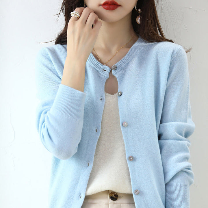 Women's cozy elegant patterned cardigan. Long-sleeve for stylish, versatile layering.