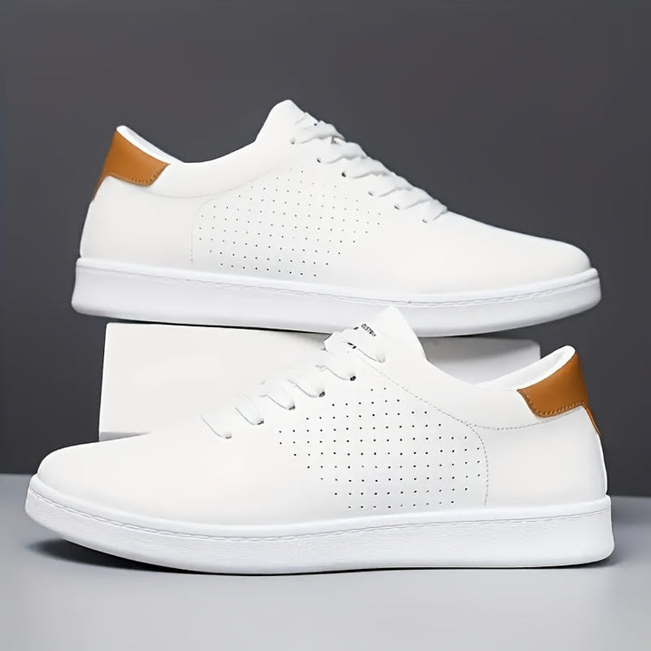 Classic men's black low-top trainers, sleek everyday footwear offering comfort and modern casual style.