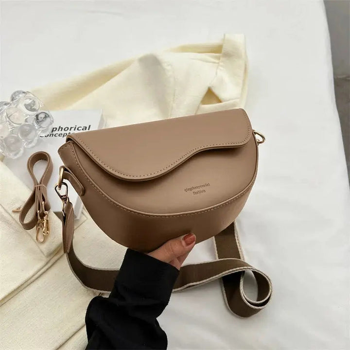 Chic women's everyday handbag, luxurious feel, compact design & organized storage.