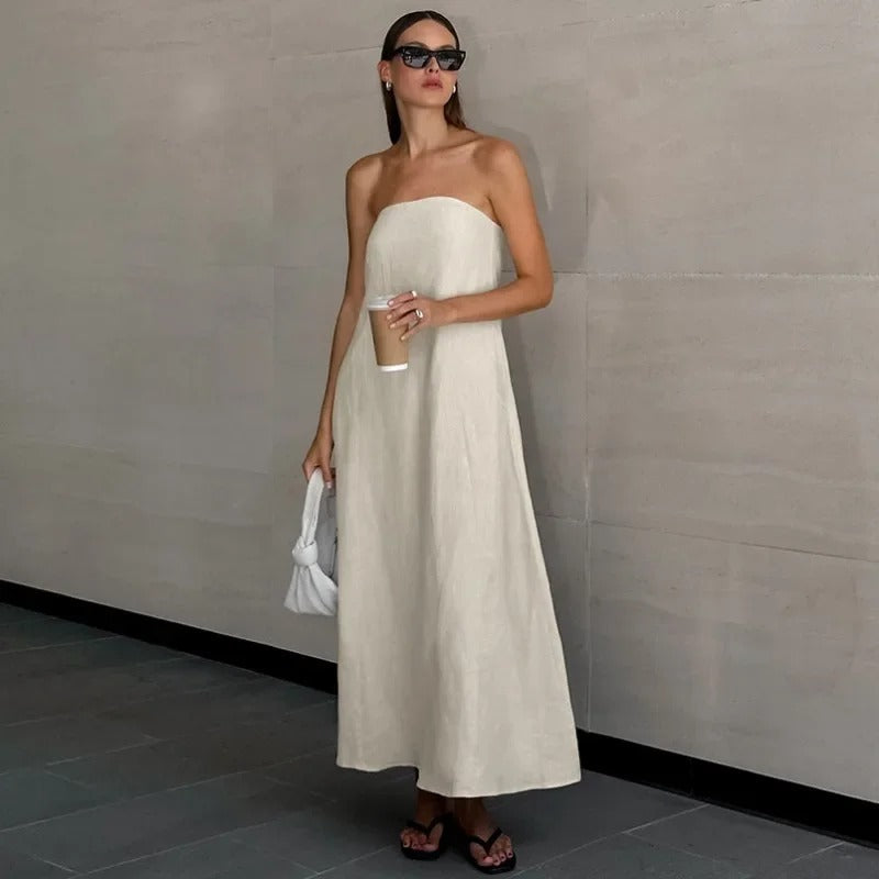 Flowing women's elegant strapless maxi dress for summer. Relaxed fit, minimalist chic, perfect for holiday wear.