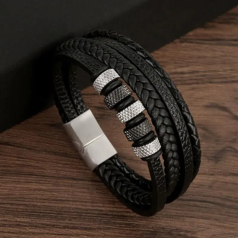 Timeless unisex accessory: a robust leather bracelet featuring a secure, stylish buckle closure for any occasion.