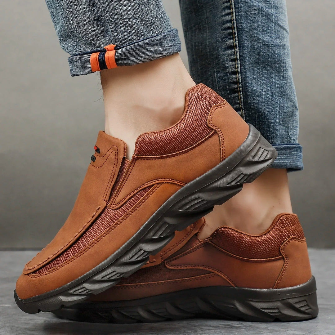Gray men's casual loafers, ideal comfortable footwear for everyday style & easy travel.