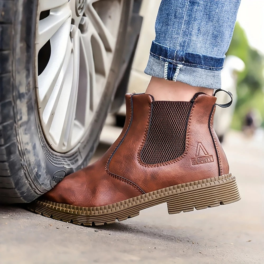 Protective men's waterproof steel toe footwear, slip-resistant for construction, industrial & outdoor tasks.