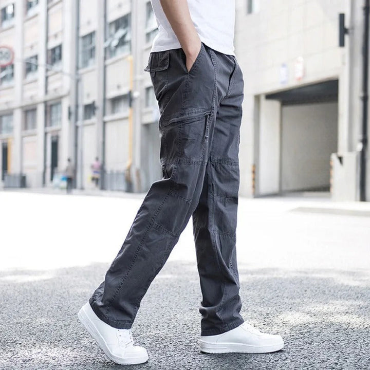 Comfortable gray men's stretch cargo pants, ideal for casual wear & everyday utility fashion.