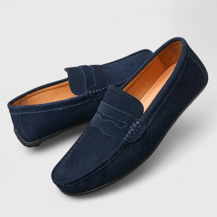 Walk in comfort with these men's slip-on loafers; flexible sole & cushioned for all-day daily wear.