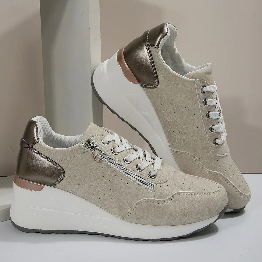 Sleek women's platform wedge sneakers, lace-up and side zip for easy wear & walking.
