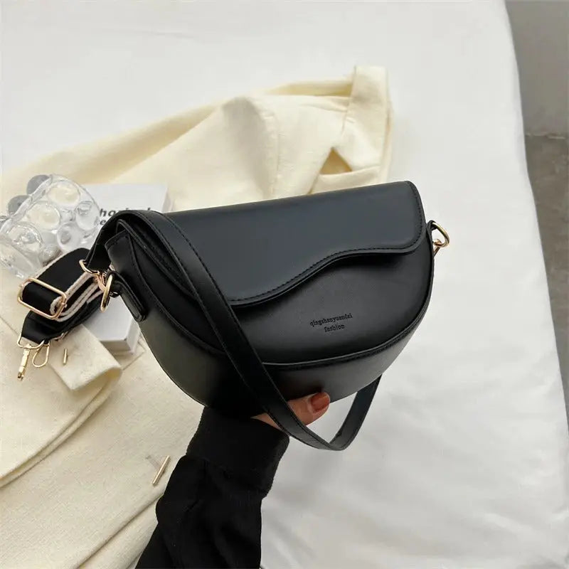Luxurious women's everyday shoulder bag, a chic fashion accessory with compact design.
