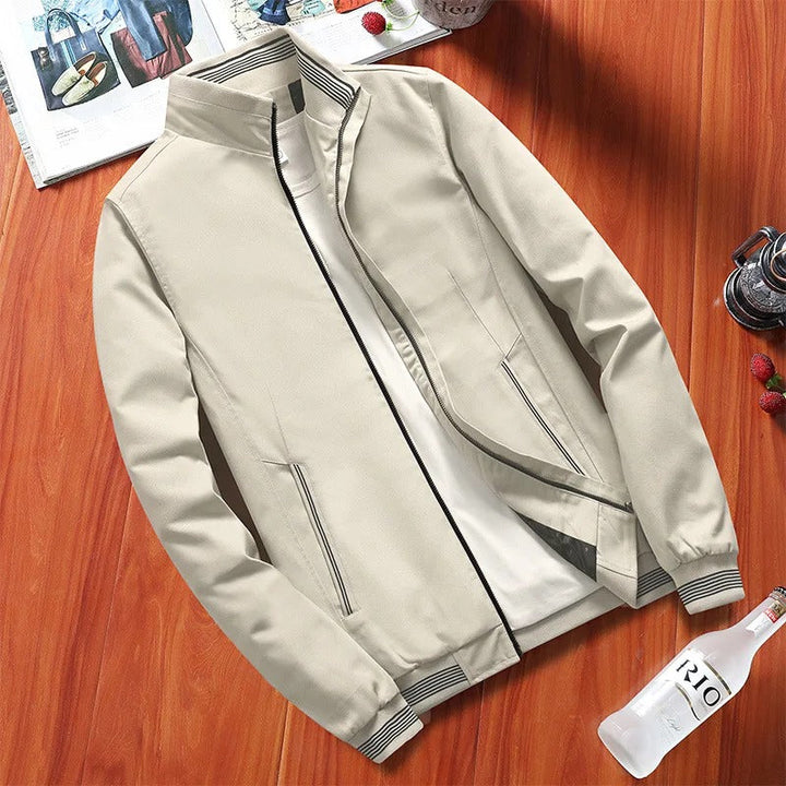 Textured men's lightweight transitional jacket. Weather-resistant fabric, great for stylish spring & fall outerwear.