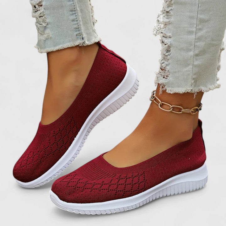 Supportive orthopaedic women's slip-on shoes, offering arch support & wide fit for lasting foot comfort.