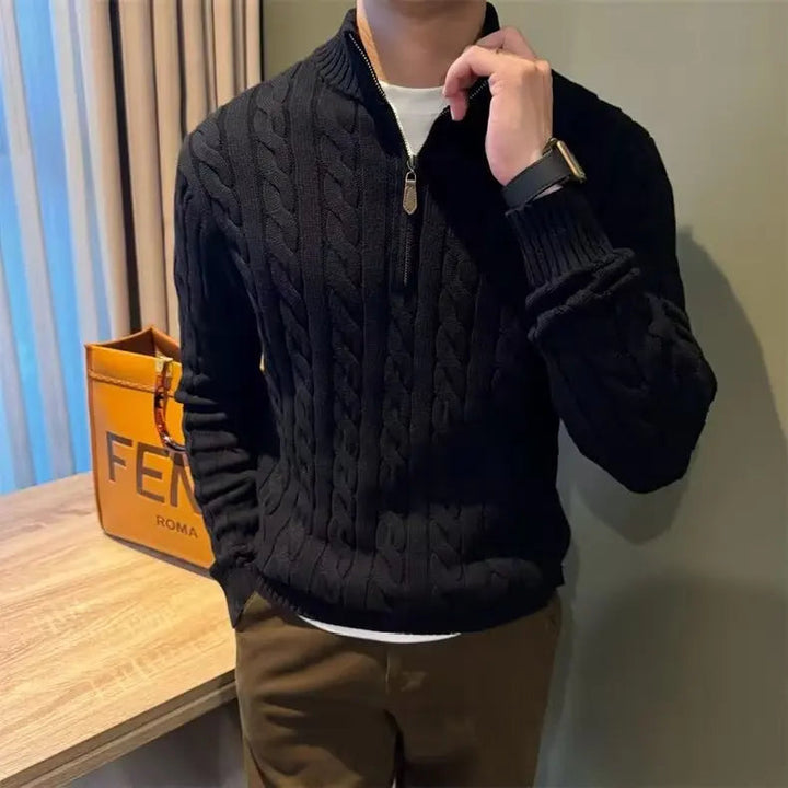 Richly textured men's cable knit sweater with a convenient zip-up front for warmth.