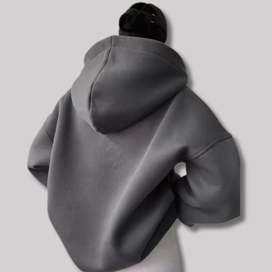 Women's everyday oversized pullover hoodie. Stylish notch neck sweatshirt, perfect for casual outfits.