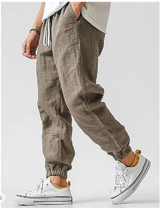 Green men's high-waist cargo pants, offering comfortable, versatile style perfect for casual wear.