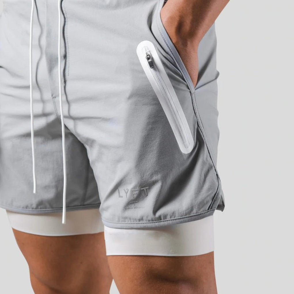 Men's performance 2-in-1 workout shorts, ideal for running, training, and sports; essential activewear.
