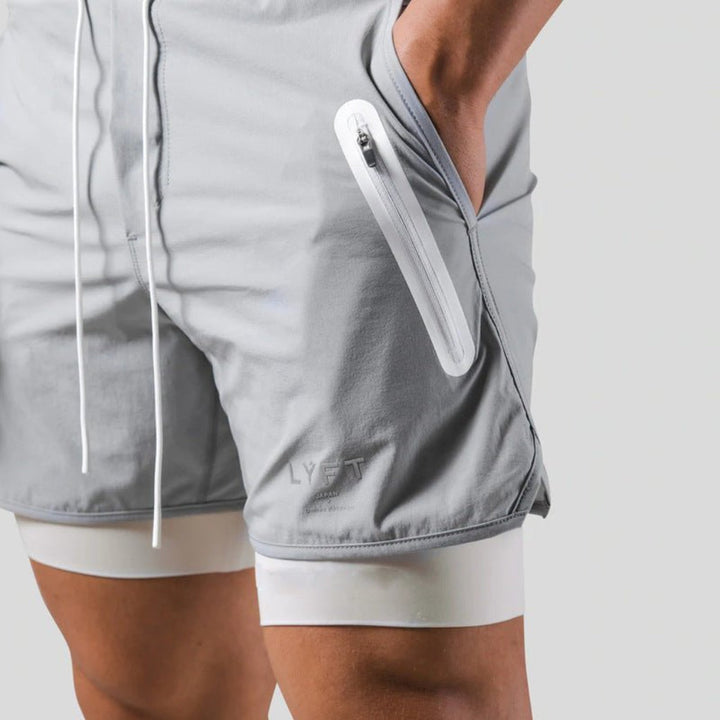 Men's performance 2-in-1 workout shorts, ideal for running, training, and sports; essential activewear.