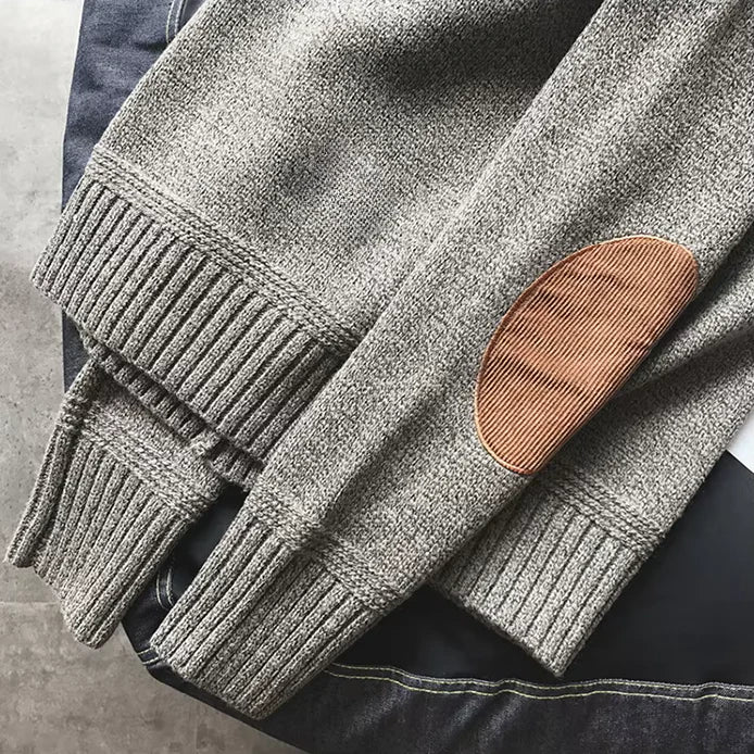 Full view of men's cozy alpine comfort knit sweater, a stylish pullover for winter.