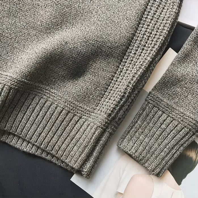 Experience ultimate comfort with this men's alpine knit sweater, essential warm clothing for winter.