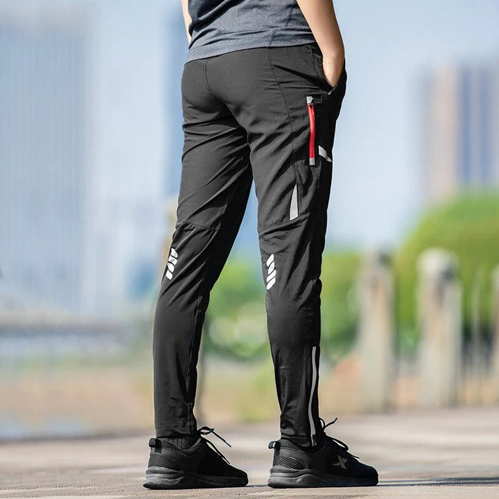 Versatile men's stretch cycling trousers with reflective gear, offering comfort & safety for all cycling activities.
