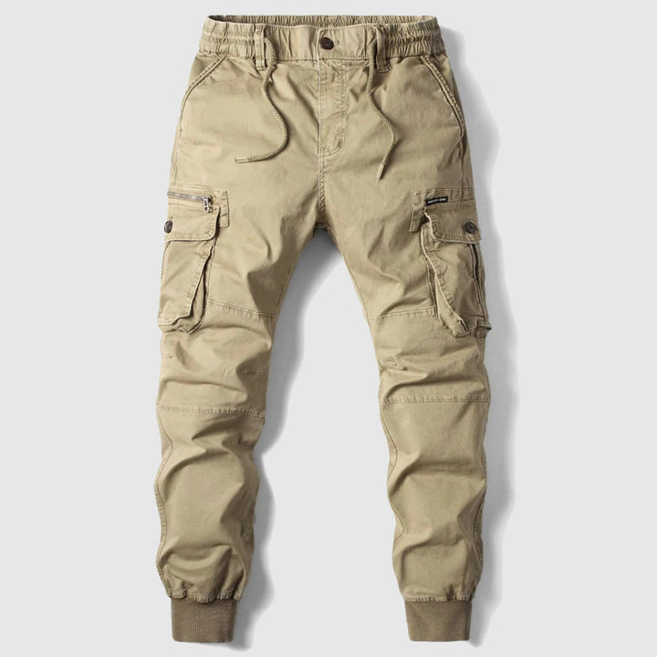 Black men's cargo joggers. Versatile streetwear pants with multiple functional pockets for style and utility.