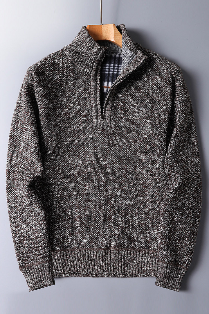 Comfortable gray ribbed quarter zip sweater for men. A versatile mock neck top for fall and winter style.