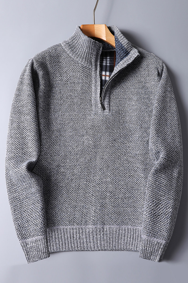 Men's blue ribbed quarter zip sweater, a versatile piece of men's clothing for various occasions.