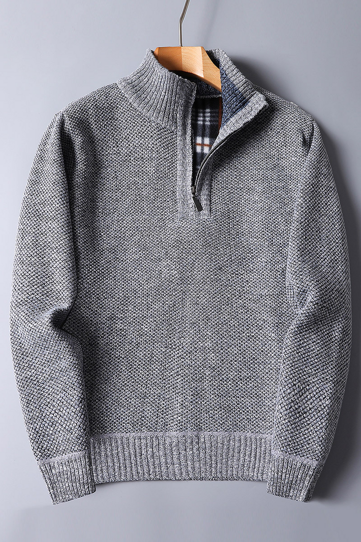 Men's blue ribbed quarter zip sweater, a versatile piece of men's clothing for various occasions.