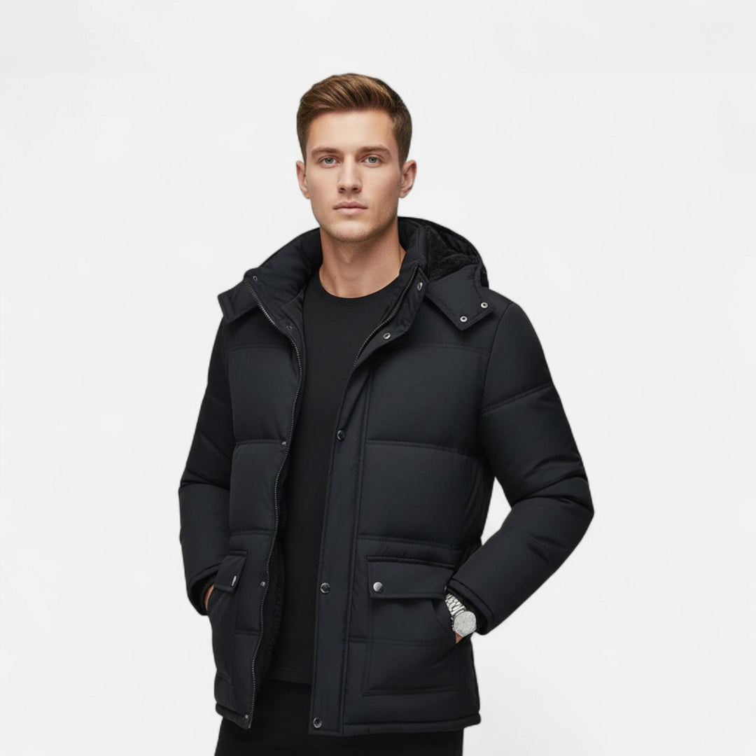 Insulated men's hooded jacket, black, plush lining for warmth. Ideal winter coat & cold weather fashion.