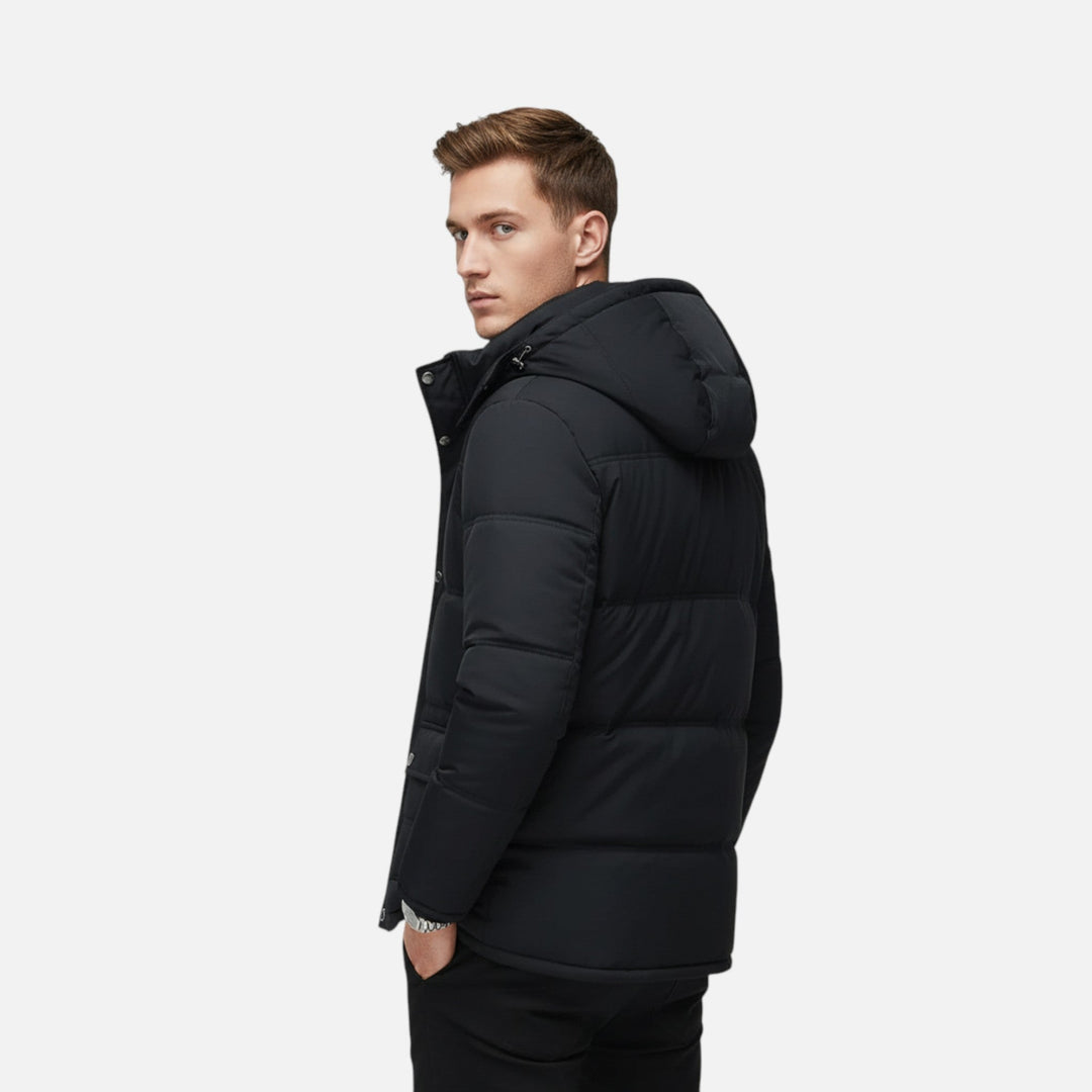 Warm men's padded black jacket, hooded, with plush lining. Excellent for winter and cold weather activities.