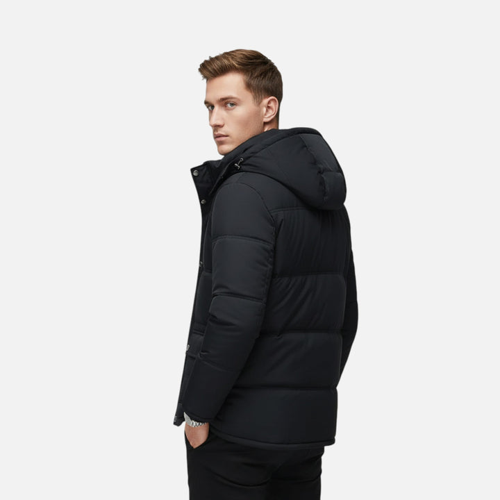 Warm men's padded black jacket, hooded, with plush lining. Excellent for winter and cold weather activities.