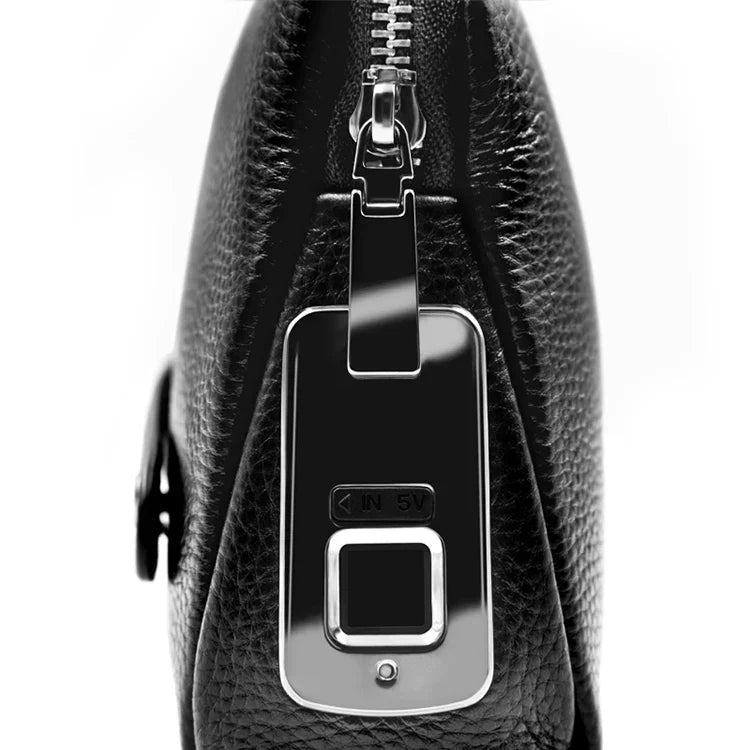 Travel-ready men's leather anti-theft clutch. Biometric fingerprint lock secures your wallet & essentials on the go.