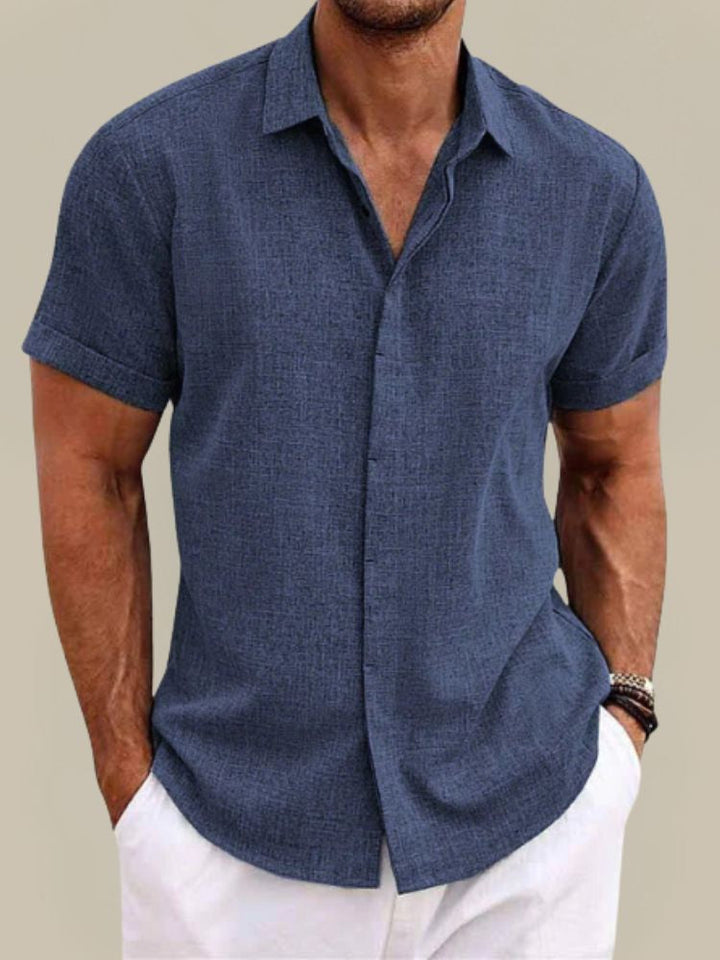 Men's breathable lightweight short sleeve button-up shirt, perfect for summer comfort & warm weather.