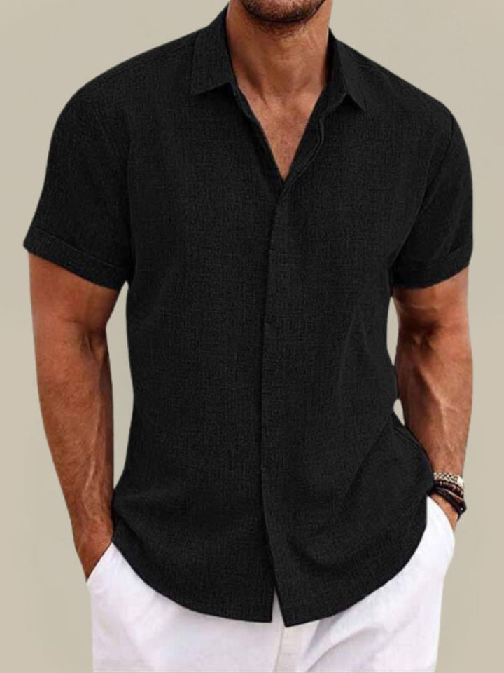Summer-ready men's short sleeve button-up shirt. Breathable, lightweight, and perfect for casual wear.