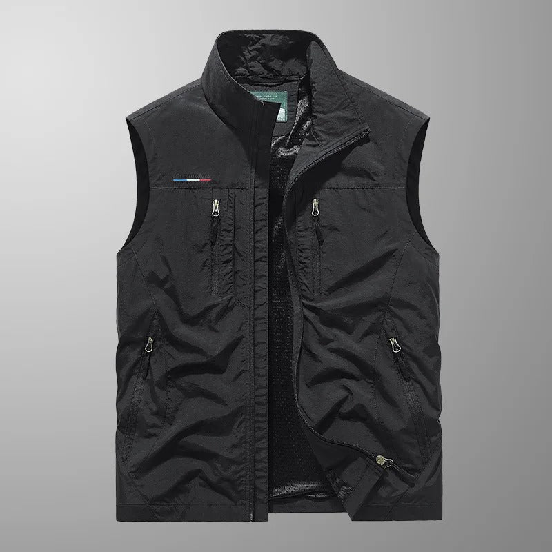 Multi-pocket men's cargo vest. Breathable, lightweight outdoor gear for hiking, fishing, and travel adventures.