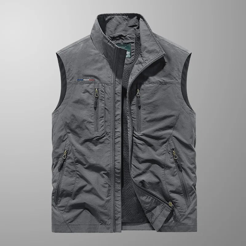 Men's adventure cargo vest. Breathable utility vest for fishing, hiking & travel. Lightweight, multi-pocket design.