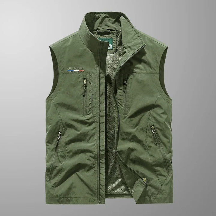 Rugged men's utility cargo vest with multiple pockets. Breathable, lightweight design for outdoor hiking & fishing.
